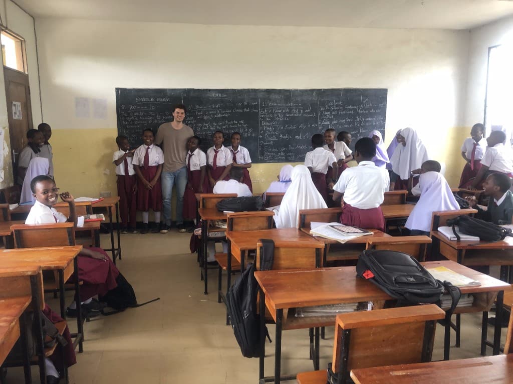 Victor visiting a classroom in Tanzania during Twiga research